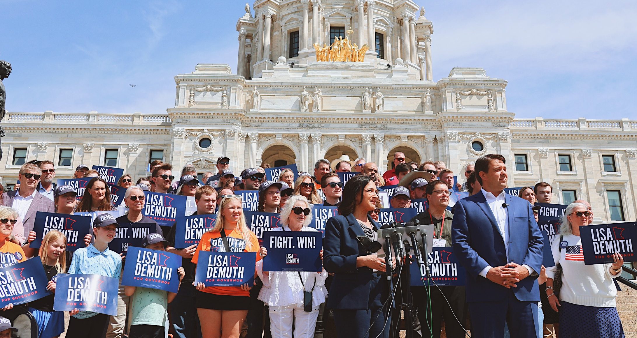 Lisa Demuth and Ryan Wilson on the Capitol steps in Saint Paul