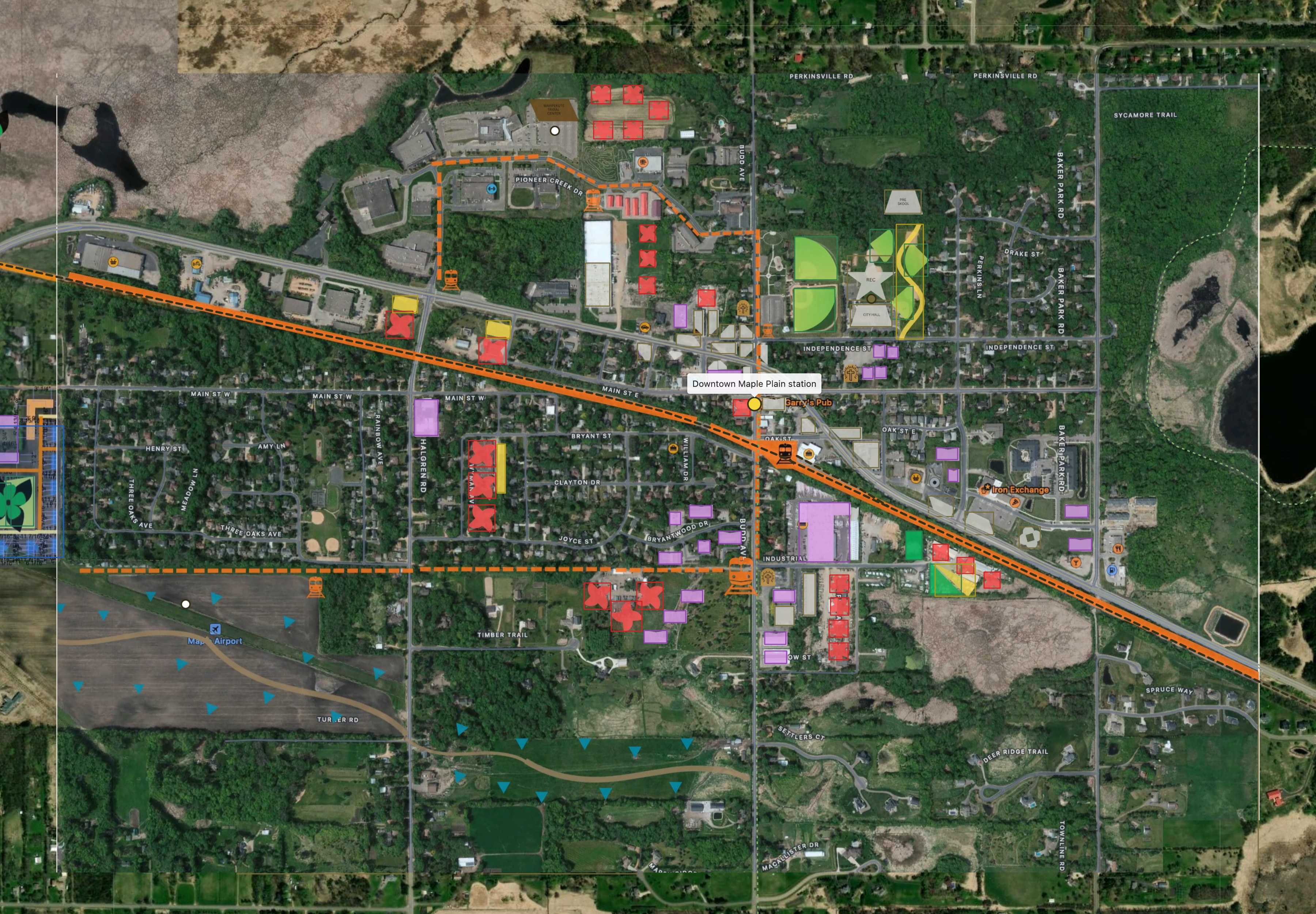 The downtown Maple Plain half of the plan on the aerial: the station at Budd Avenue, the circulator loop, the recreation center and city hall, and the fields by Maple Airport