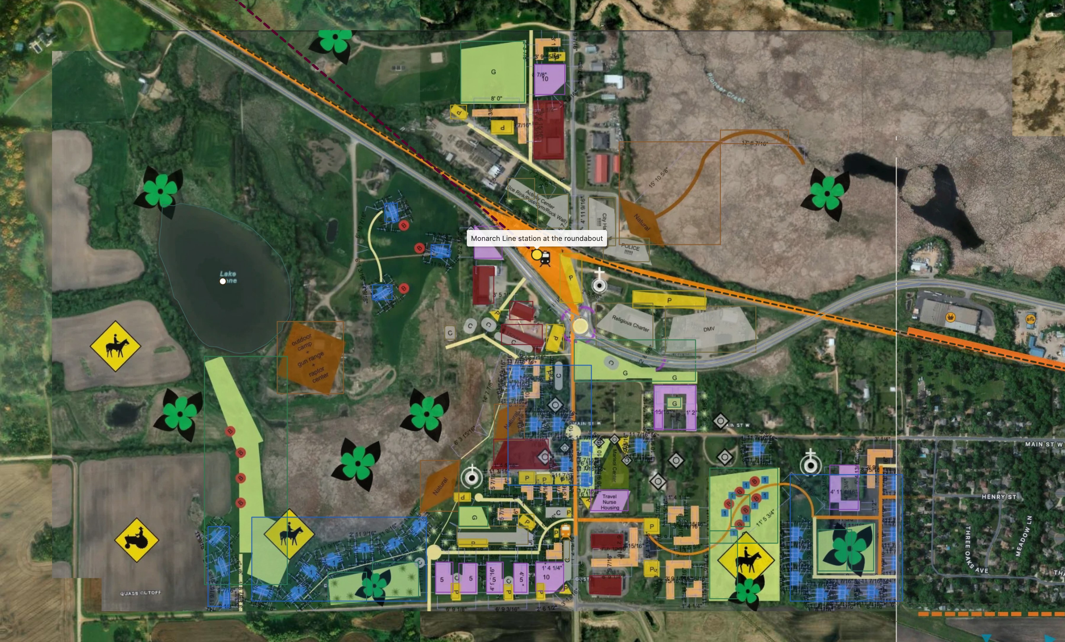 The Independence half of the plan on the aerial: Lake Irene, the roundabout station, the civic core, townhome neighborhoods and the greenway loop